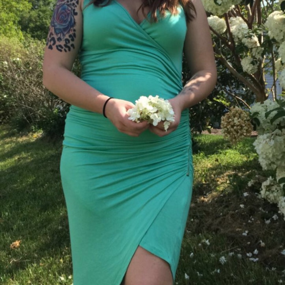 A symmetrical dress teal